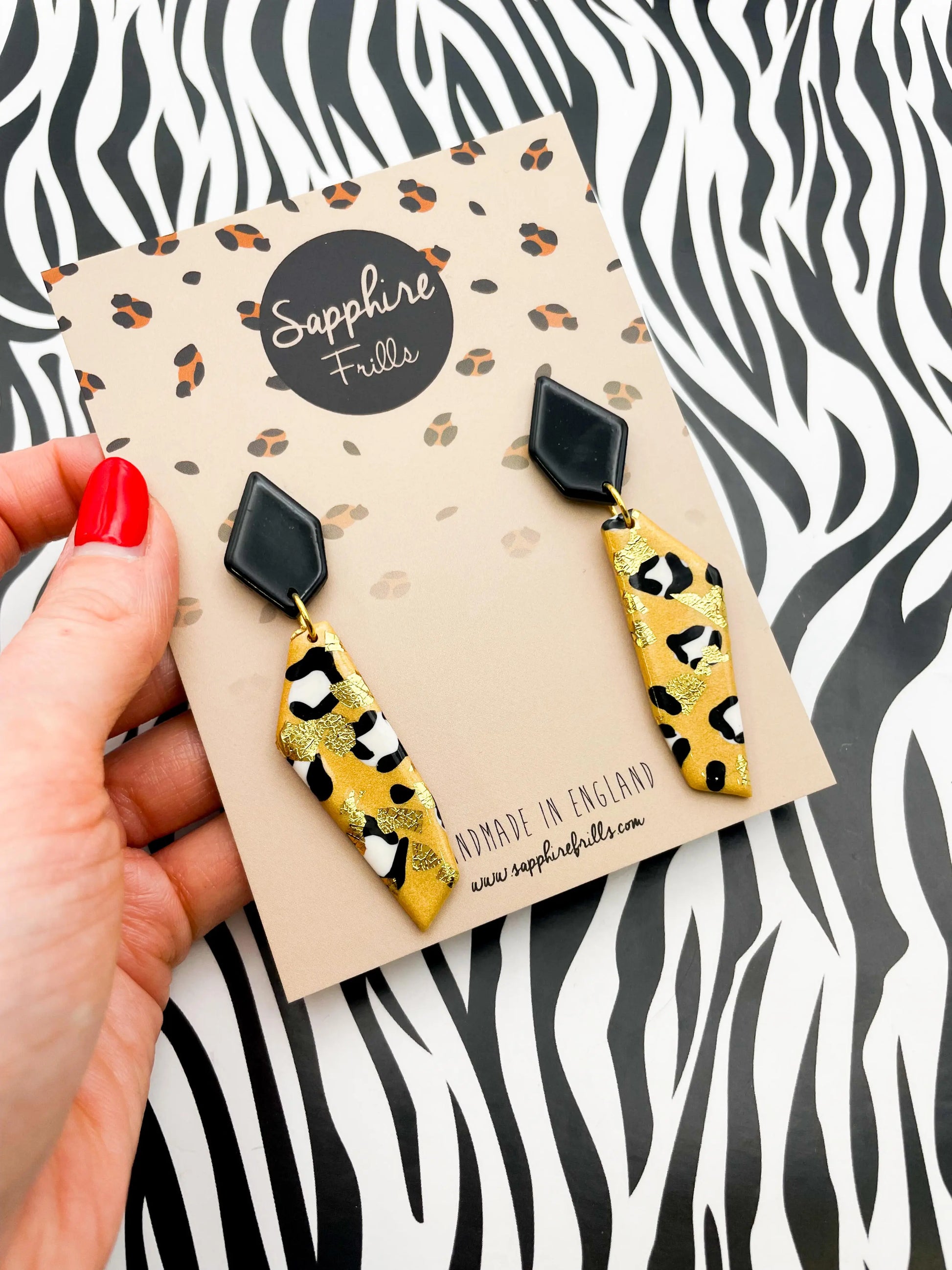 Metallic Gold and White Leopard Print Stone Dangle Earrings from Sapphire Frills